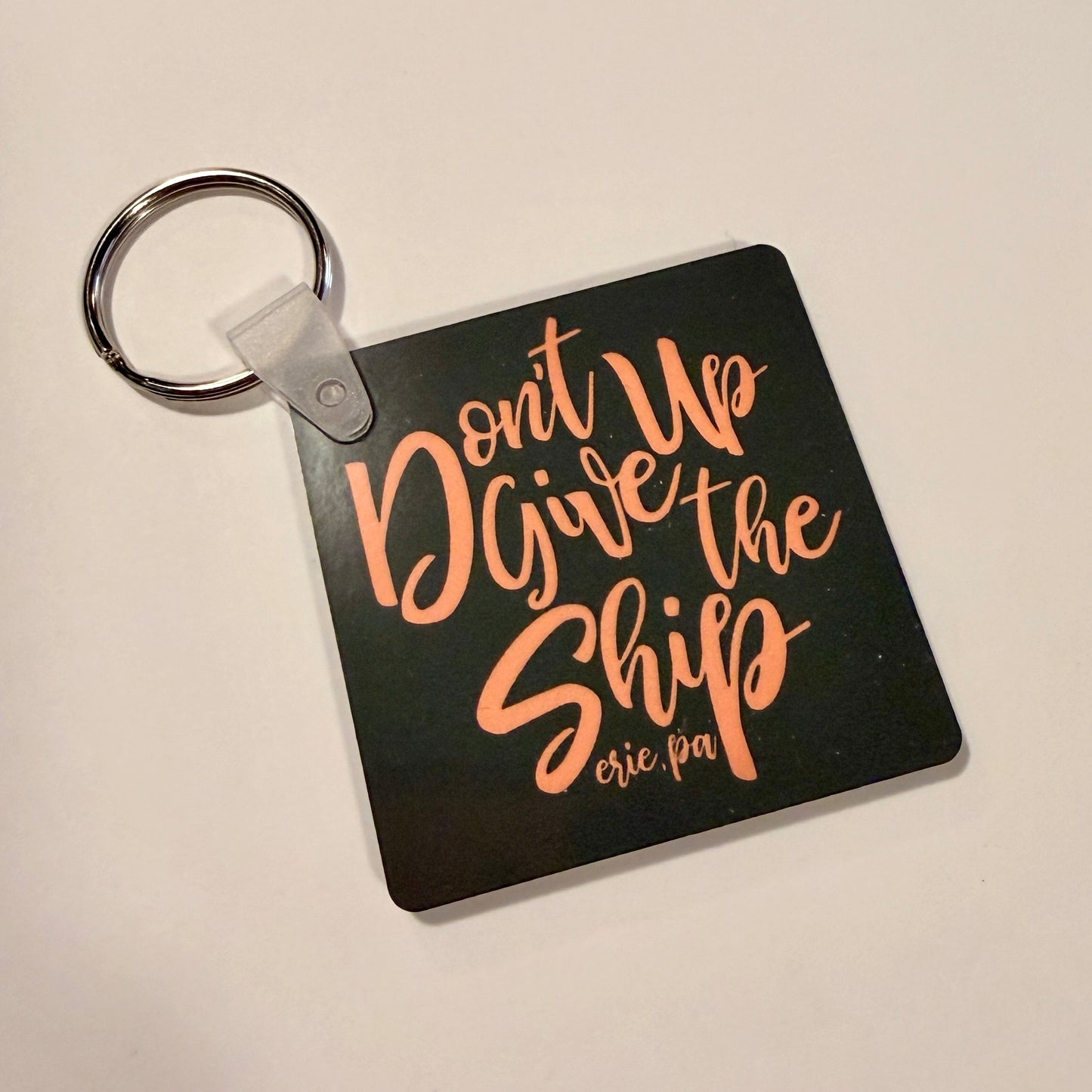 Don't Give Up the Ship Keychain (Various Colors)