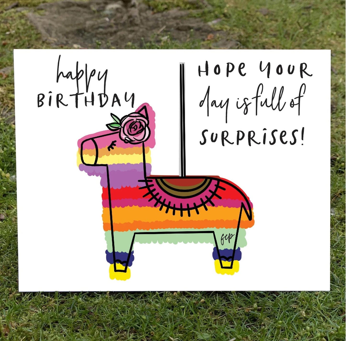 A birthday card with a bright colorful drawing.