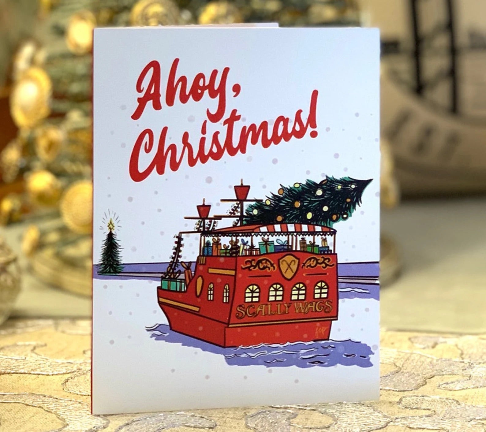 A holiday card with a fun play on words depicting the Scallywags
