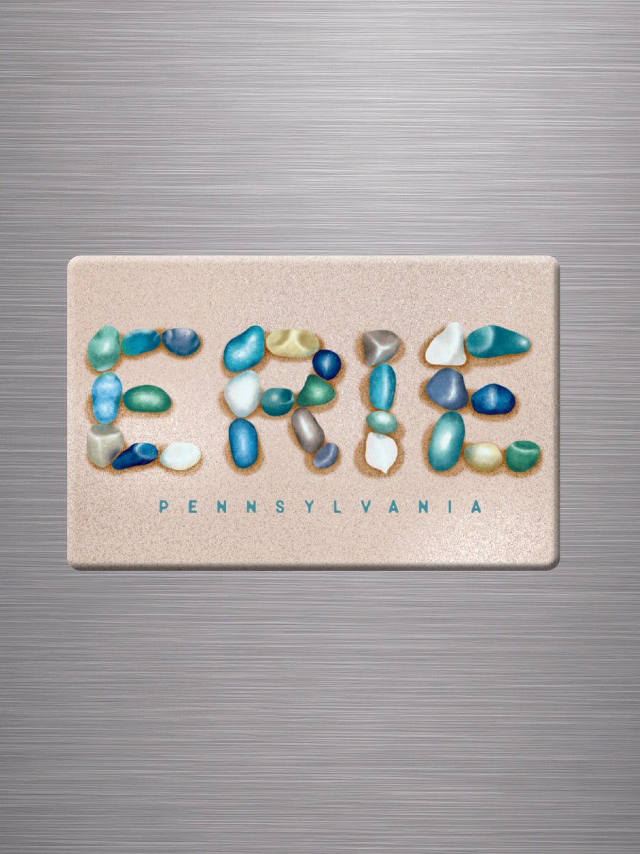 A magnet with beautiful beach glass artwork