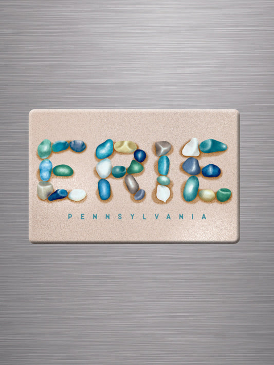 A magnet with beautiful beach glass artwork