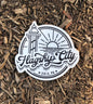 A black and white vinyl decal of the Flagship City
