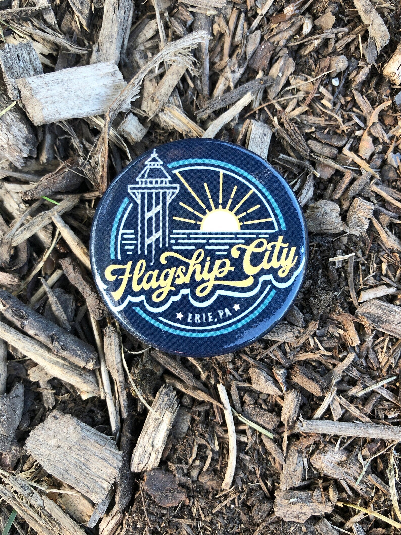 A round magnet with a logo,style design