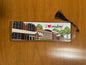 Bookmark in vinyl sleeve with a colorful design of the Blasco Library