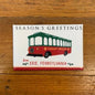 A magnet with an illustrated design of the local trolly 